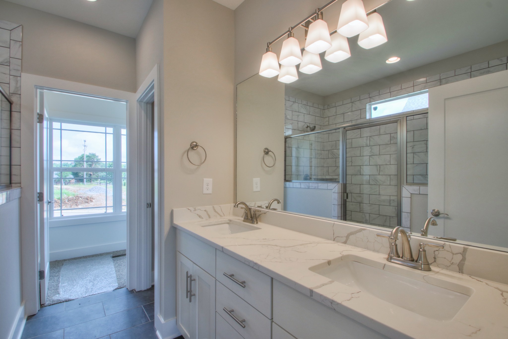 1140 Commerce Church Road Watertown, TN 37184 - Photo 14 of 21 a bathroom with a sink double vanity and a mirror