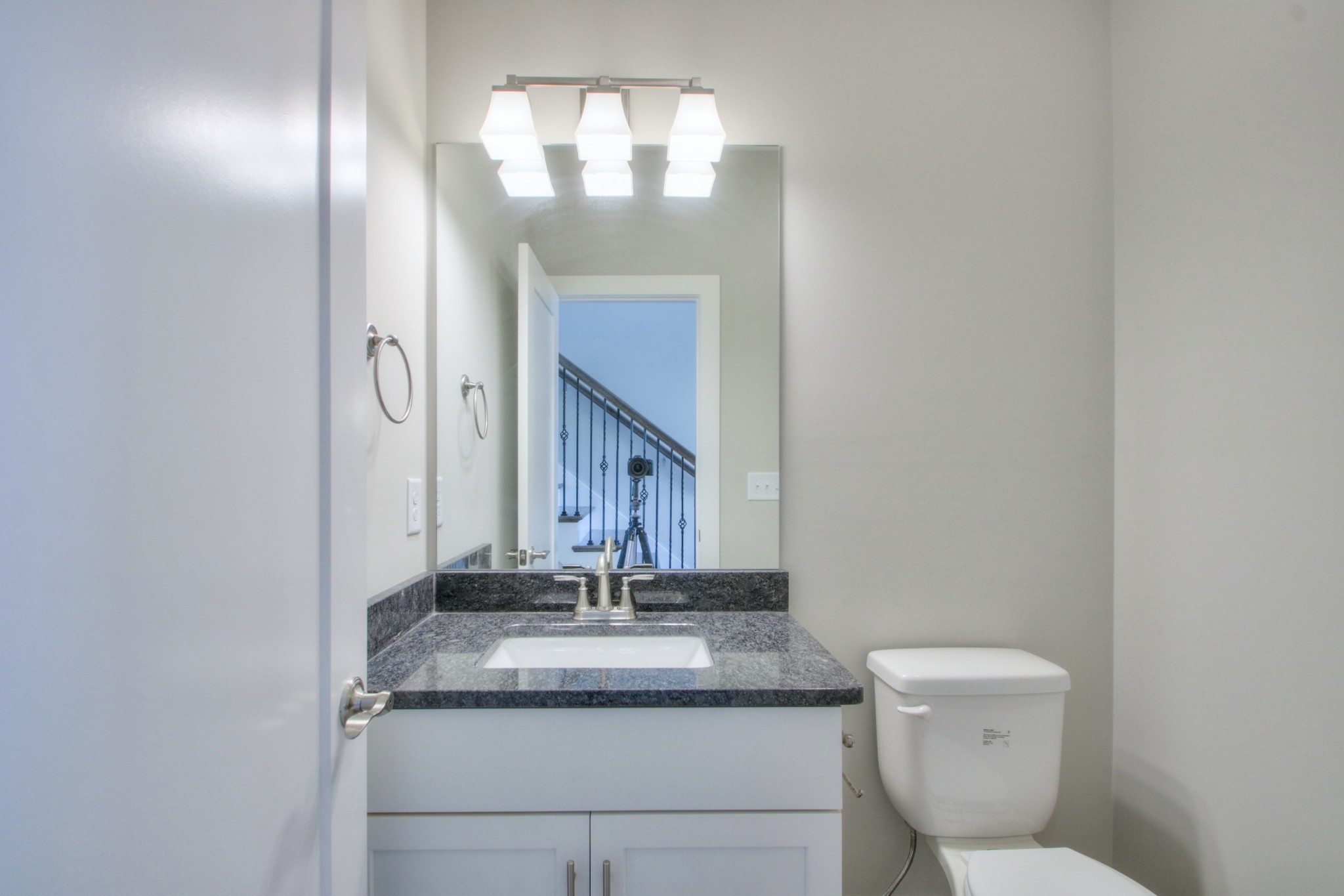 1140 Commerce Church Road Watertown, TN 37184 - Photo 17 of 21 a bathroom with a granite countertop sink and a toilet