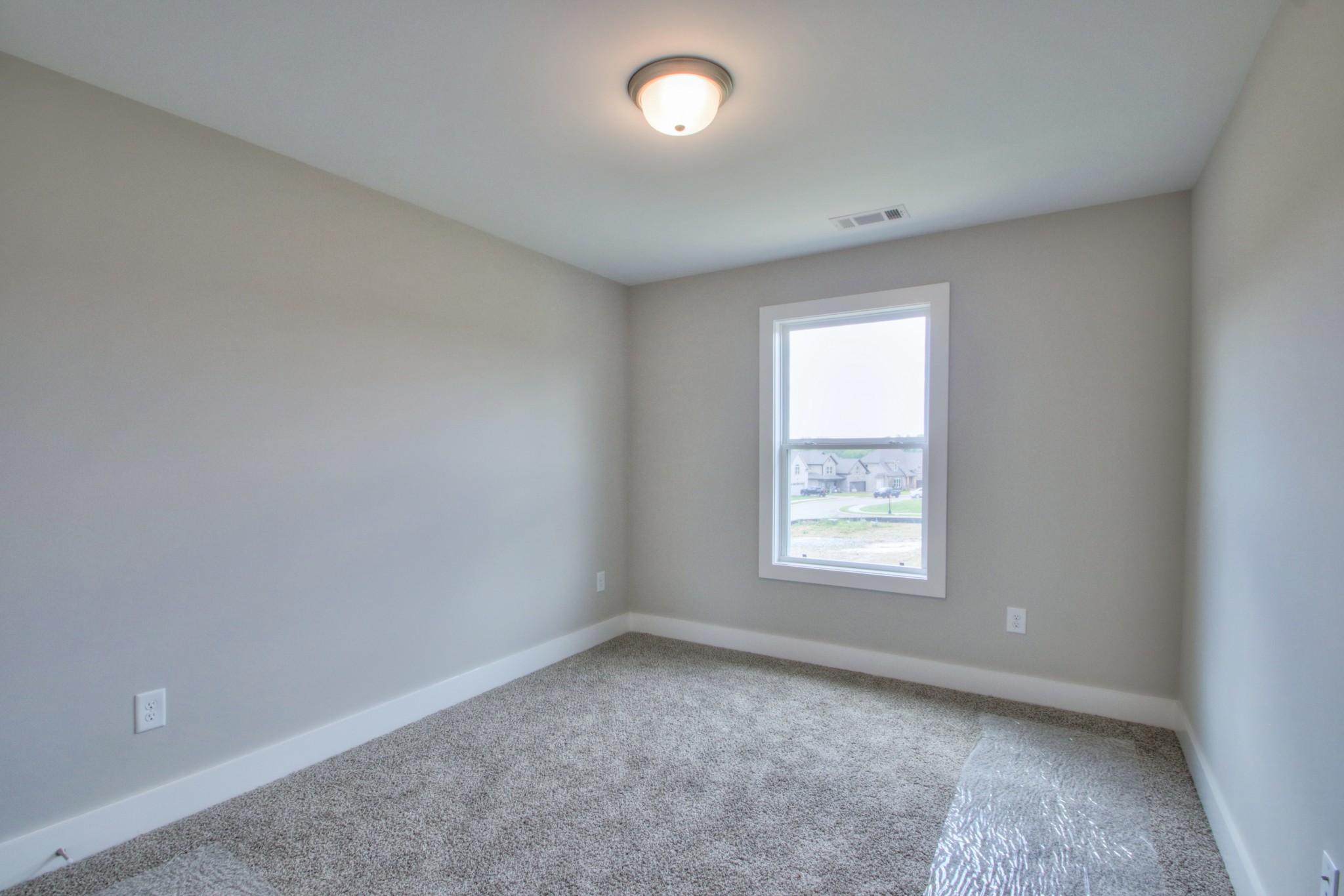 1140 Commerce Church Road Watertown, TN 37184 - Photo 18 of 21 an empty room with a window and a fireplace