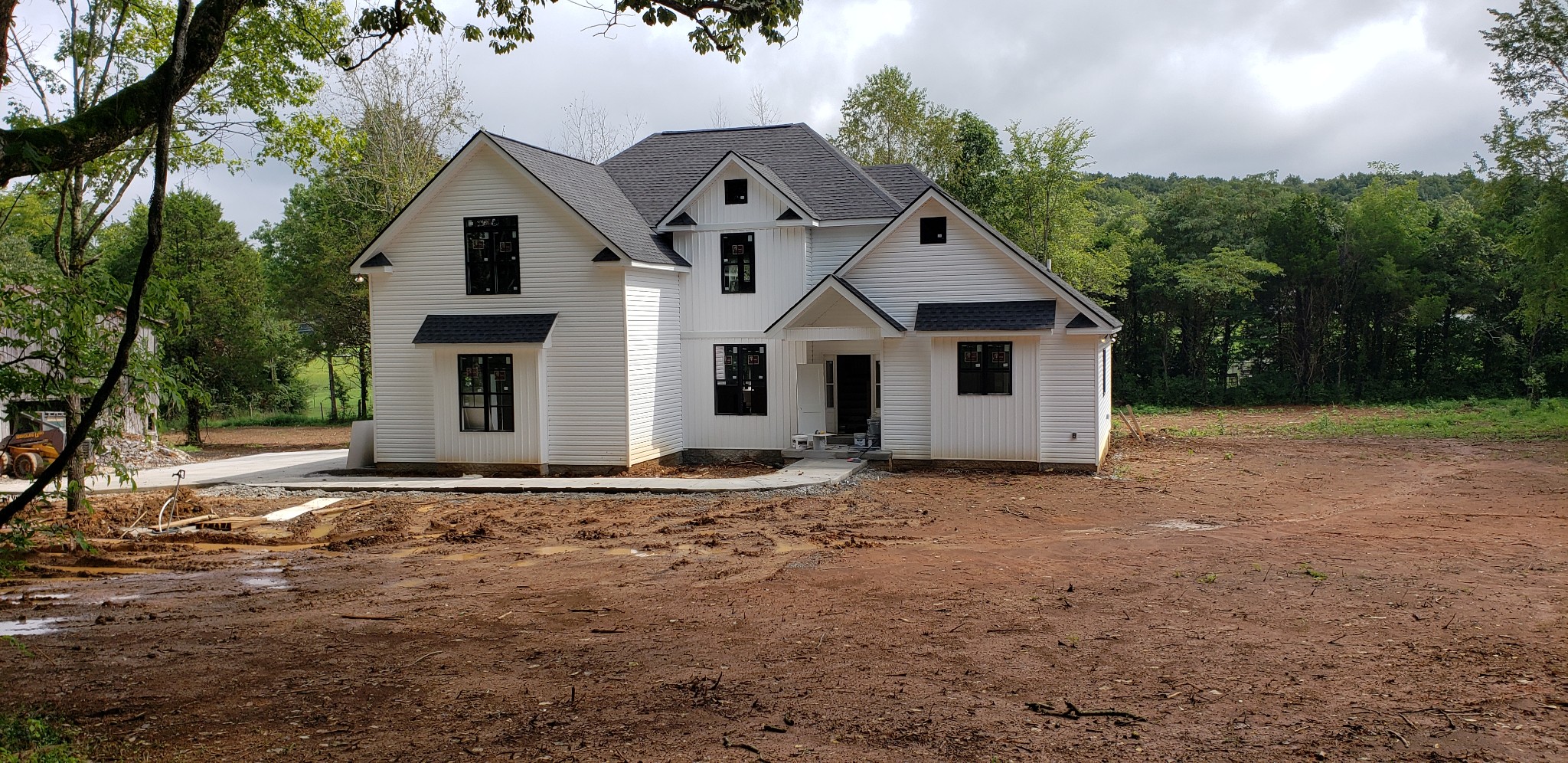 1140 Commerce Church Road Watertown, TN 37184 - Photo 3 of 21 a front view of a house with a yard