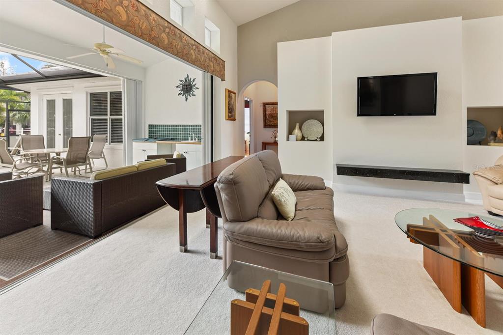 3267 Sugarloaf Key Road Punta Gorda, FL 33955 - Photo 35 of 83 a living room with furniture and a flat screen tv