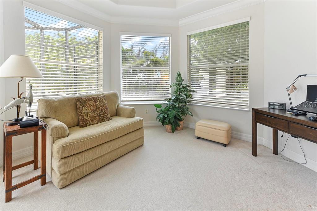 3267 Sugarloaf Key Road Punta Gorda, FL 33955 - Photo 42 of 83 a living room with furniture and a potted plant