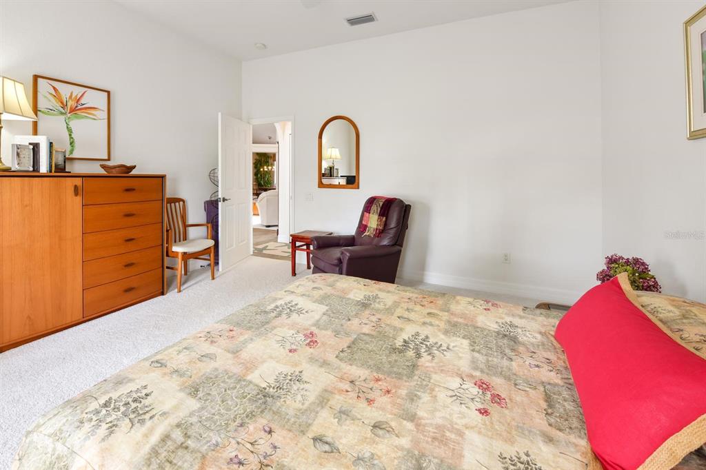 3267 Sugarloaf Key Road Punta Gorda, FL 33955 - Photo 51 of 83 a bedroom with a bed and furniture