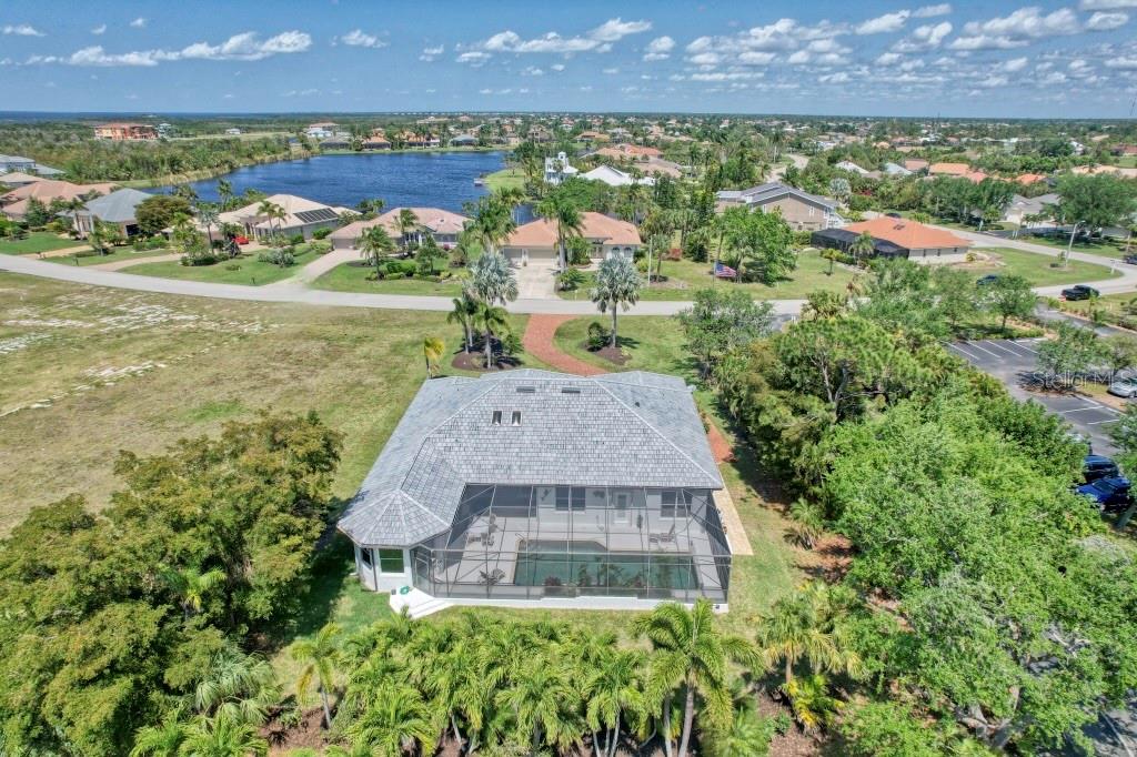 3267 Sugarloaf Key Road Punta Gorda, FL 33955 - Photo 60 of 83 an aerial view of a house with a garden and lake view