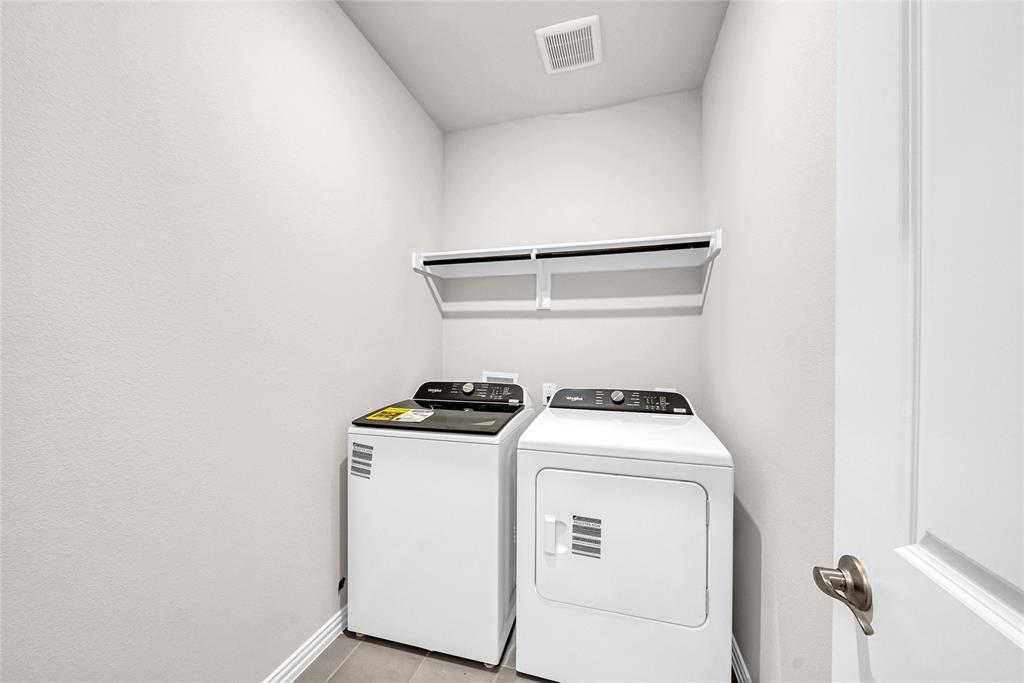 417 Martell Road Lowry Crossing, TX 75069 - Photo 20 of 29 a utility room with dryer and washer