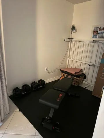 a view of balcony with furniture