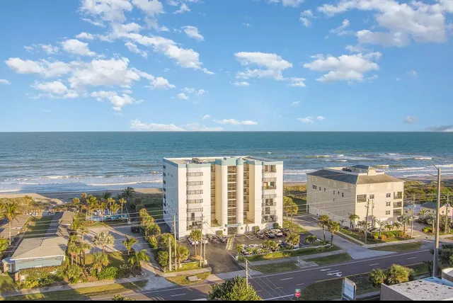 a front view of a building with outdoor view