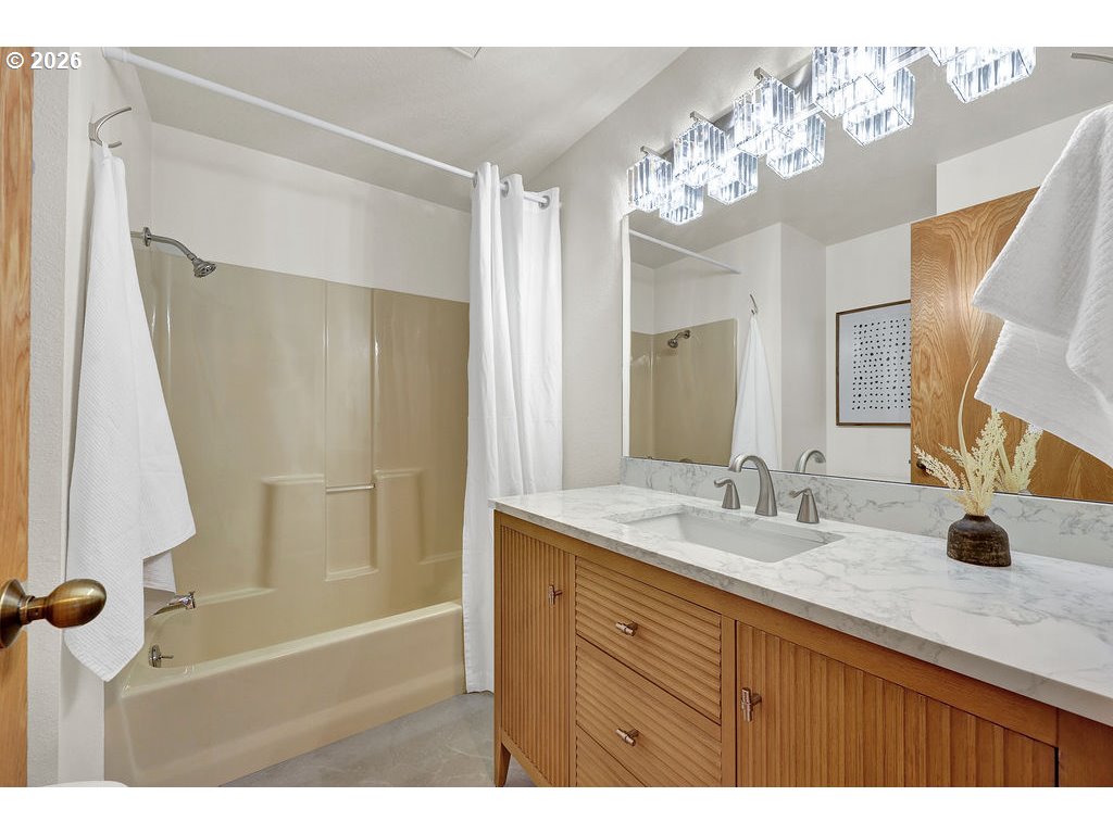 2372 South 22nd Court Florence, OR 97439 - Photo 23 of 33 a bathroom with a granite countertop sink a mirror and shower