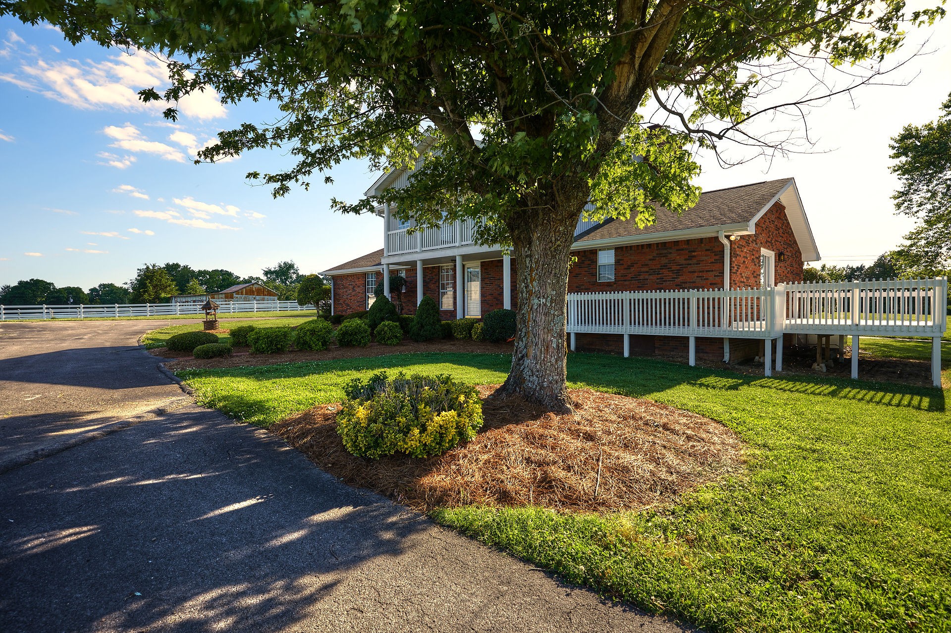 999 Centerville Road Lebanon, TN 37087 - Photo 4 of 33 a view of a house with garden and lake view