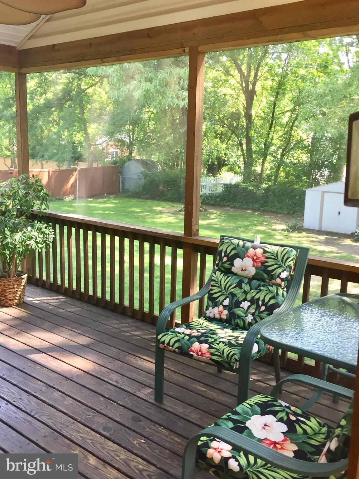 7819 Walnut Tree Road Severn, MD 21144 - Photo 9 of 23 Screened Porch with table space