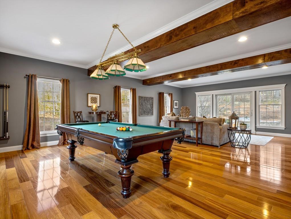 31 Greenwood Road Hopkinton, MA 01748 - Photo 12 of 27 a living room with furniture pool table and a table