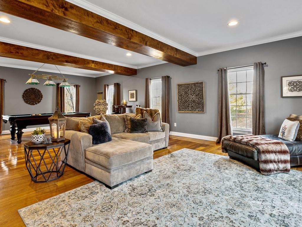 31 Greenwood Road Hopkinton, MA 01748 - Photo 13 of 27 a living room with furniture and a large window
