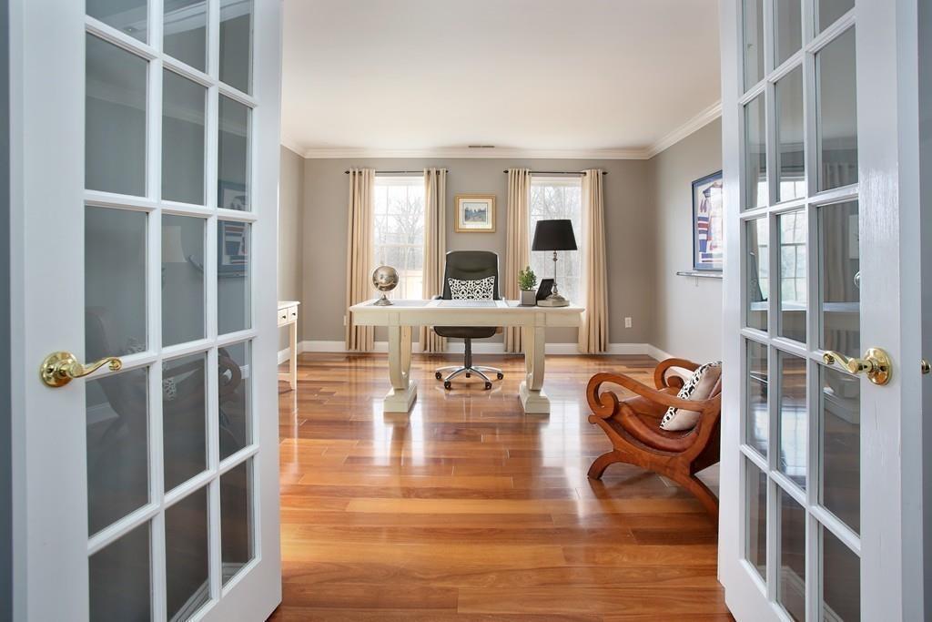 31 Greenwood Road Hopkinton, MA 01748 - Photo 20 of 27 a living room with furniture and a large window