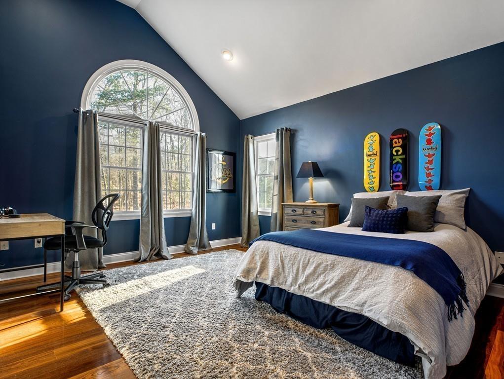 31 Greenwood Road Hopkinton, MA 01748 - Photo 21 of 27 a bedroom with a large bed and a large window