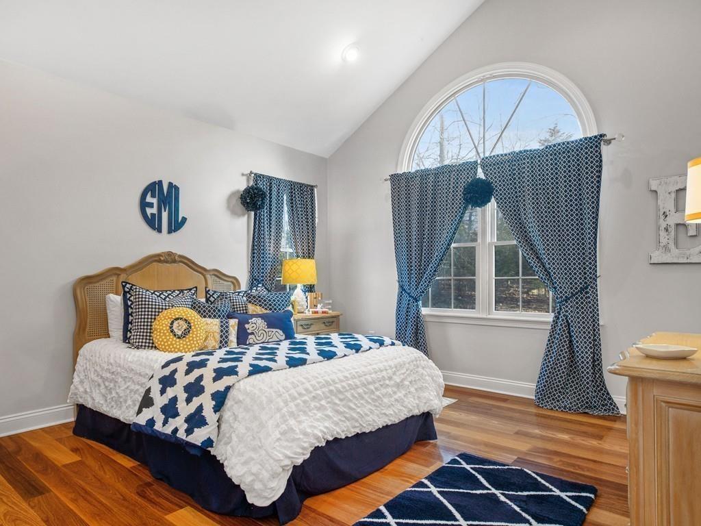 31 Greenwood Road Hopkinton, MA 01748 - Photo 22 of 27 a bedroom with a bed and a window