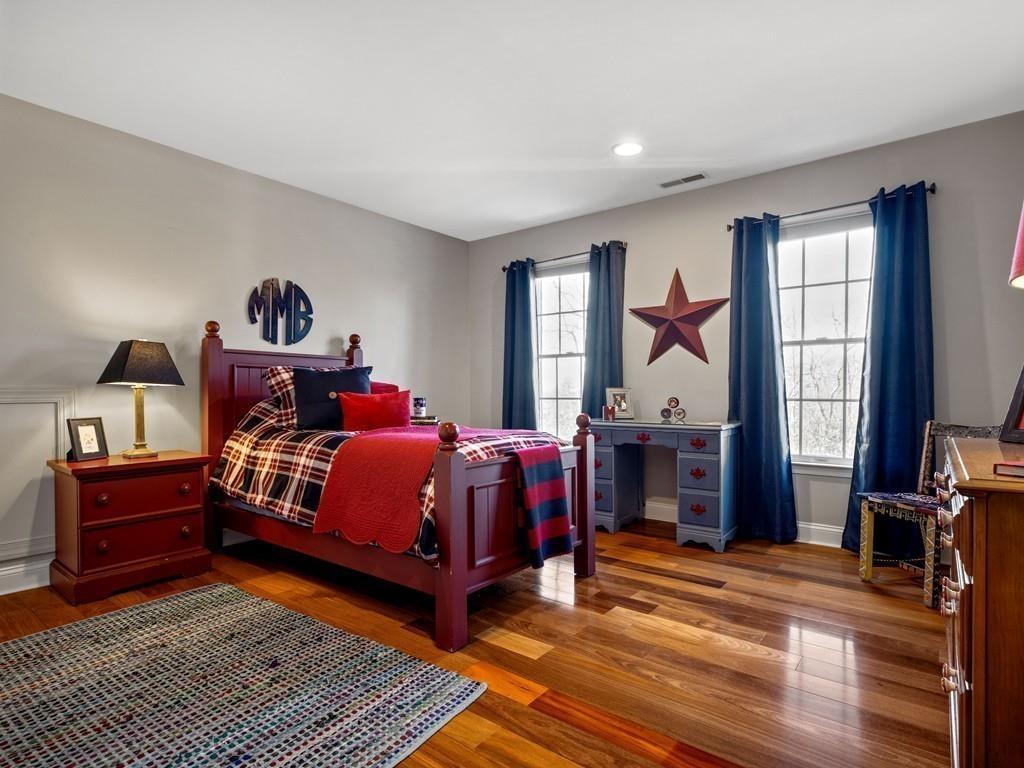 31 Greenwood Road Hopkinton, MA 01748 - Photo 23 of 27 a bed room with a bed and a window