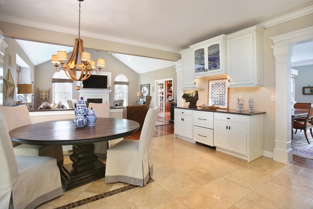 31 Greenwood Road Hopkinton, MA 01748 - Photo 4 of 27 a view of a dining room with furniture and a chandelier