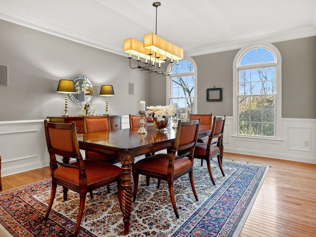 31 Greenwood Road Hopkinton, MA 01748 - Photo 8 of 27 a dining room with furniture a rug and a chandelier