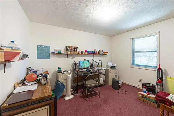 a room with furniture and a window