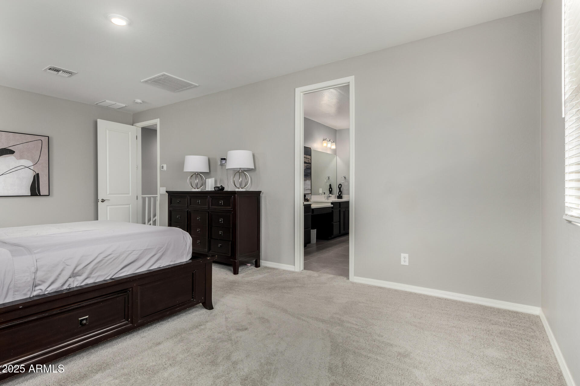 17160 North 9th Place Phoenix, AZ 85022 - Photo 17 of 46 a spacious bedroom with a bed and a dresser