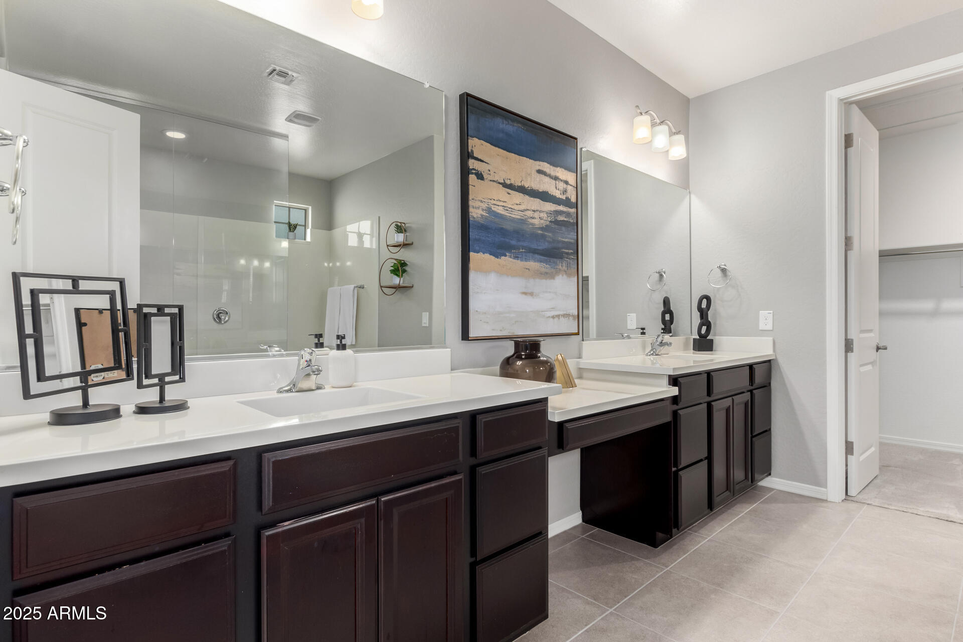 17160 North 9th Place Phoenix, AZ 85022 - Photo 19 of 46 a bathroom with a sink double vanity and a mirror