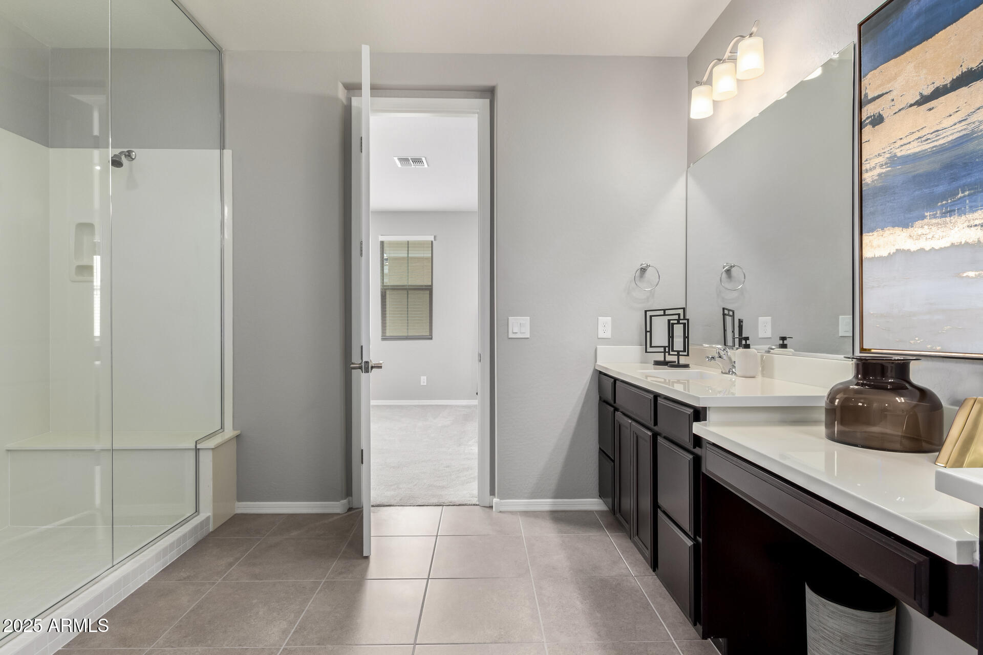 17160 North 9th Place Phoenix, AZ 85022 - Photo 21 of 46 a bathroom with a double vanity sink a and a mirror