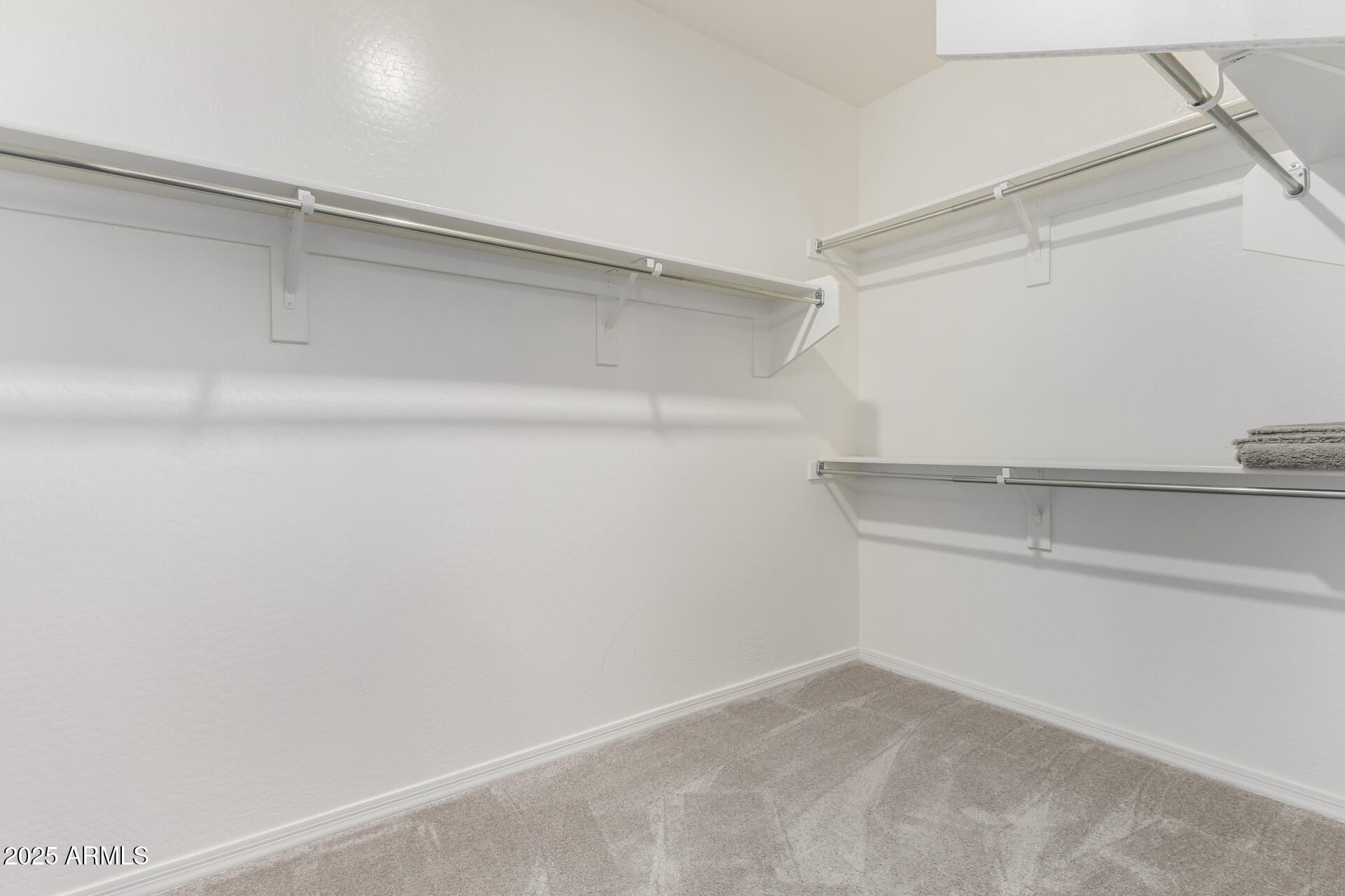 17160 North 9th Place Phoenix, AZ 85022 - Photo 22 of 46 a view of an empty walk in closet