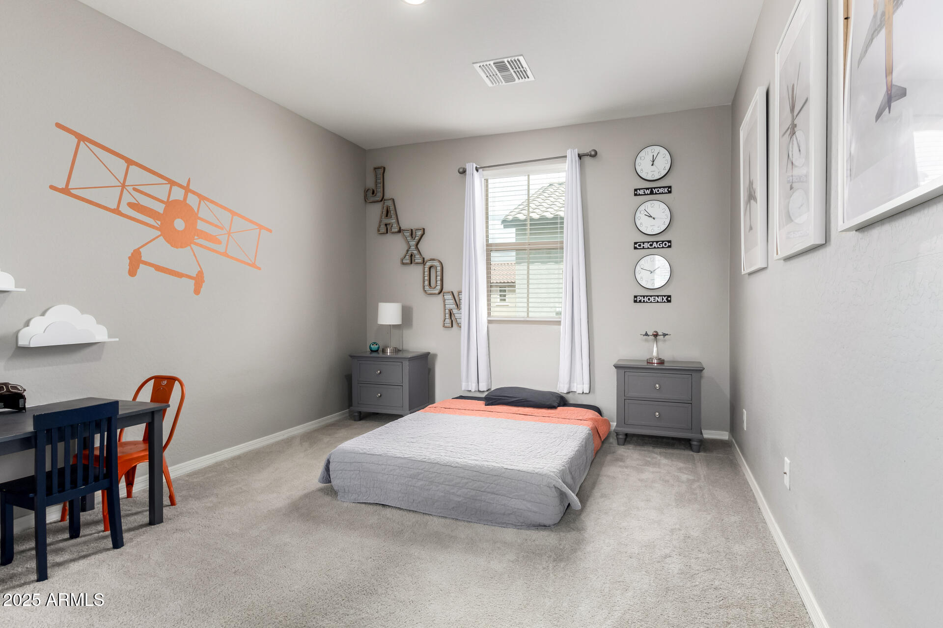 17160 North 9th Place Phoenix, AZ 85022 - Photo 27 of 46 a bedroom with a bed and a window