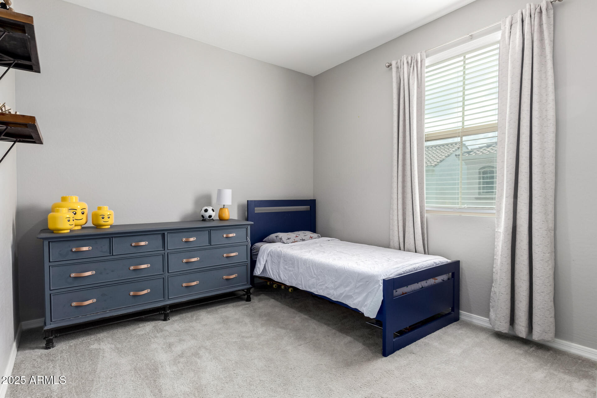 17160 North 9th Place Phoenix, AZ 85022 - Photo 32 of 46 a bedroom with a bed and a dresser