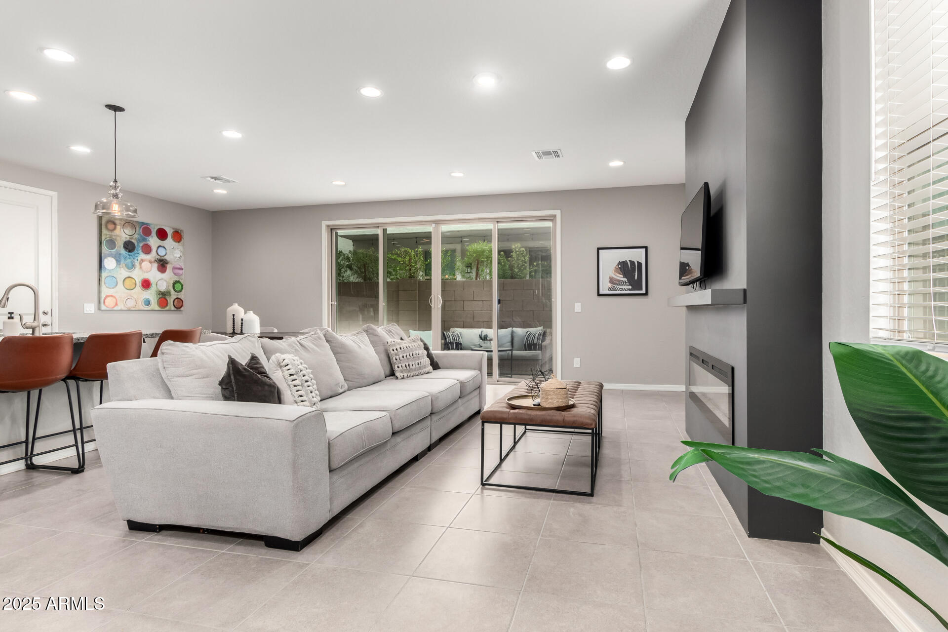 17160 North 9th Place Phoenix, AZ 85022 - Photo 4 of 46 a living room with furniture and a large window
