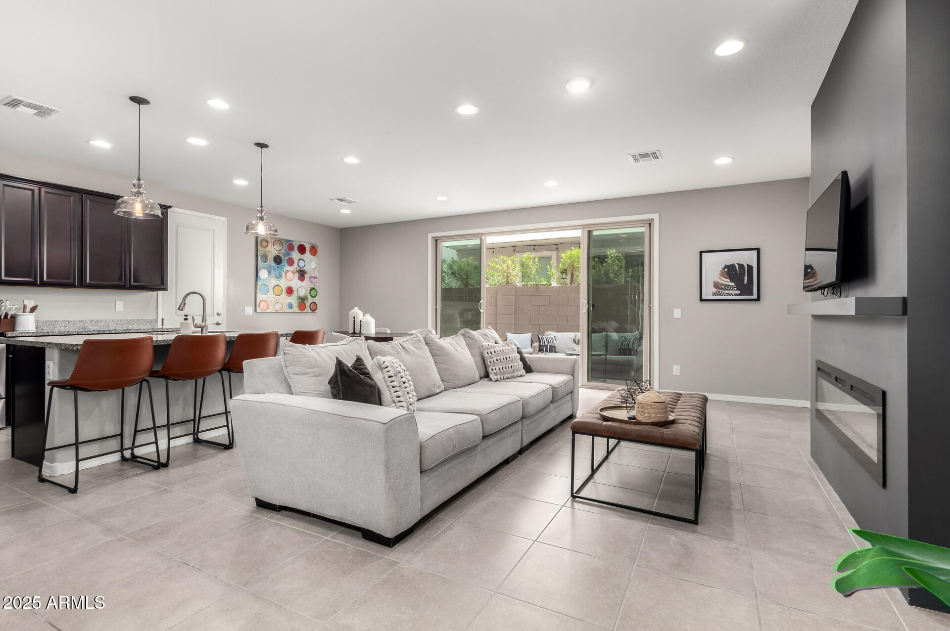 17160 North 9th Place Phoenix, AZ 85022 - Photo 7 of 46 a living room with furniture and a flat screen tv