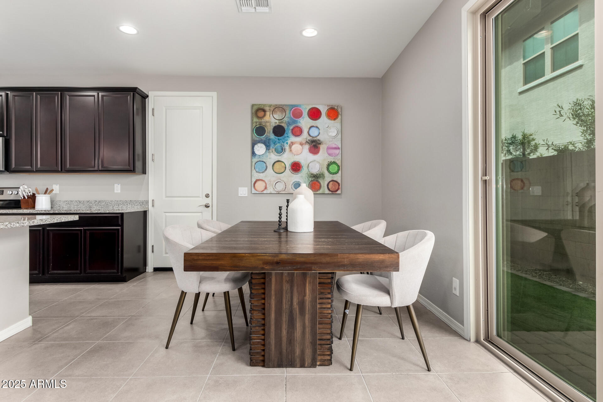 17160 North 9th Place Phoenix, AZ 85022 - Photo 8 of 46 a view of a dining room with furniture a kitchen and kitchen view