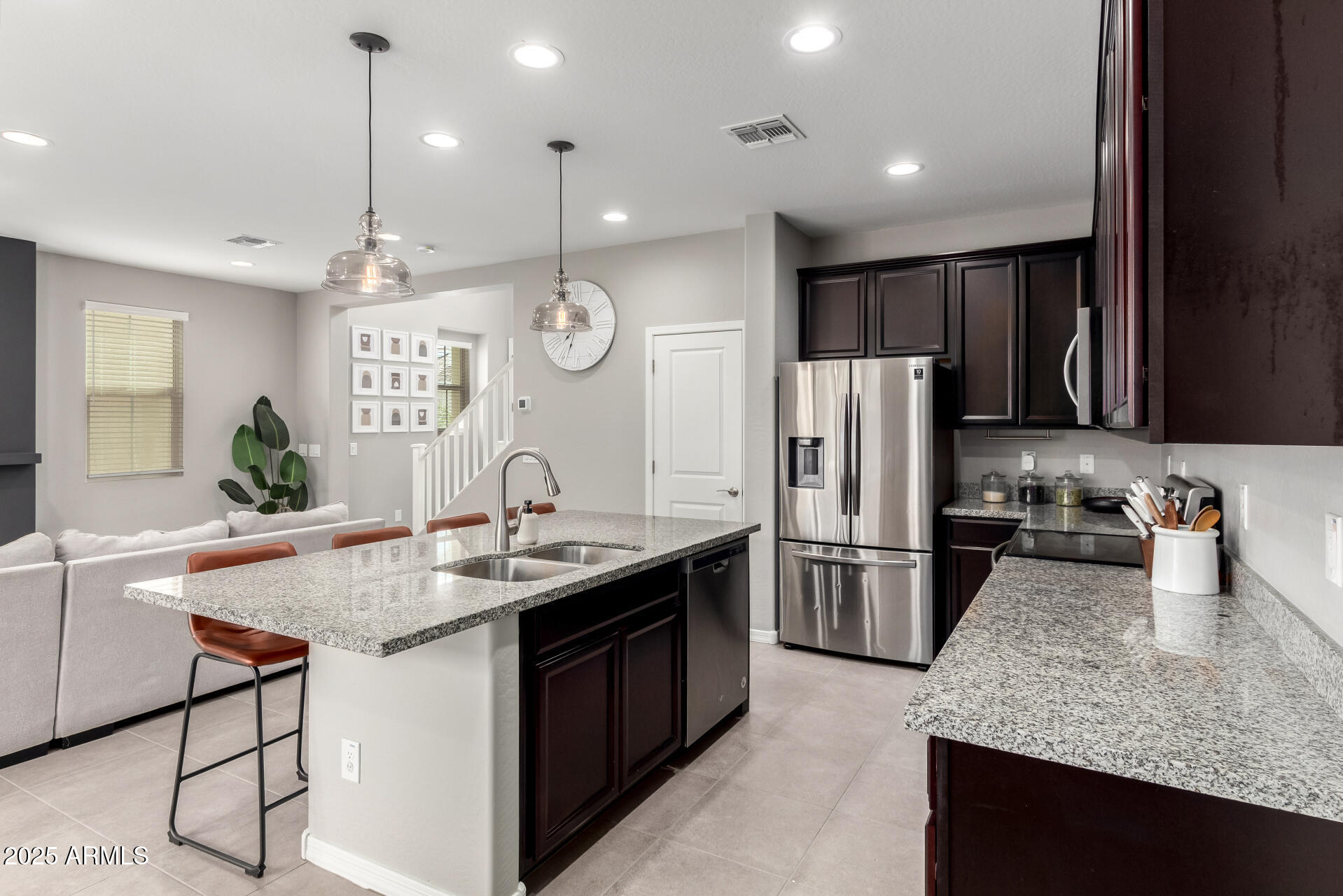 17160 North 9th Place Phoenix, AZ 85022 - Photo 10 of 46 a kitchen with refrigerator and cabinets