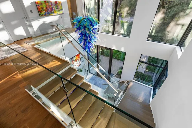 a bedroom with a bed and a lamp