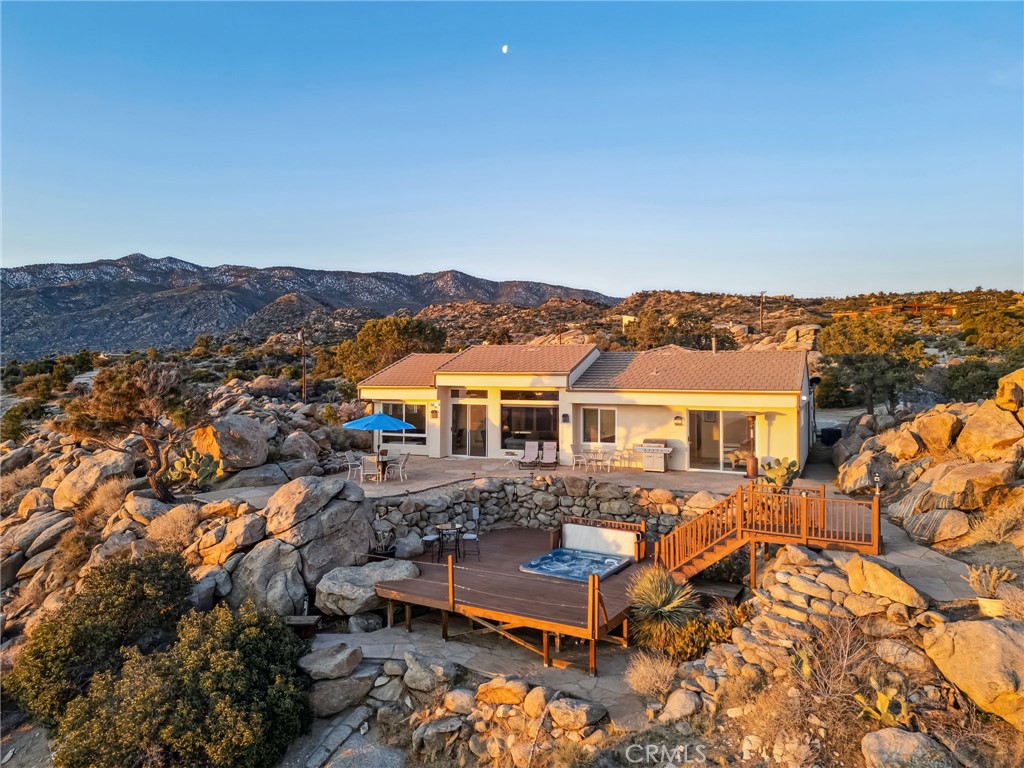 60125 Carrizo Road Mountain Center, CA 92561 - Photo 1 of 1 a view of a house with a patio