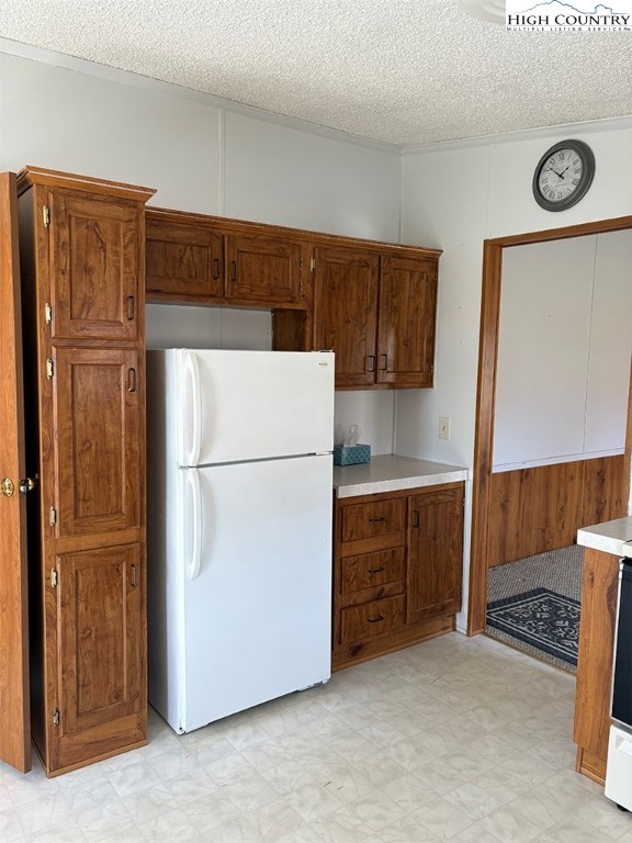 801 Howards Creek Church Road Boone, NC 28607 - Photo 8 of 26 a kitchen with cabinets and refrigerator