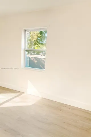 a view of a room that has a window