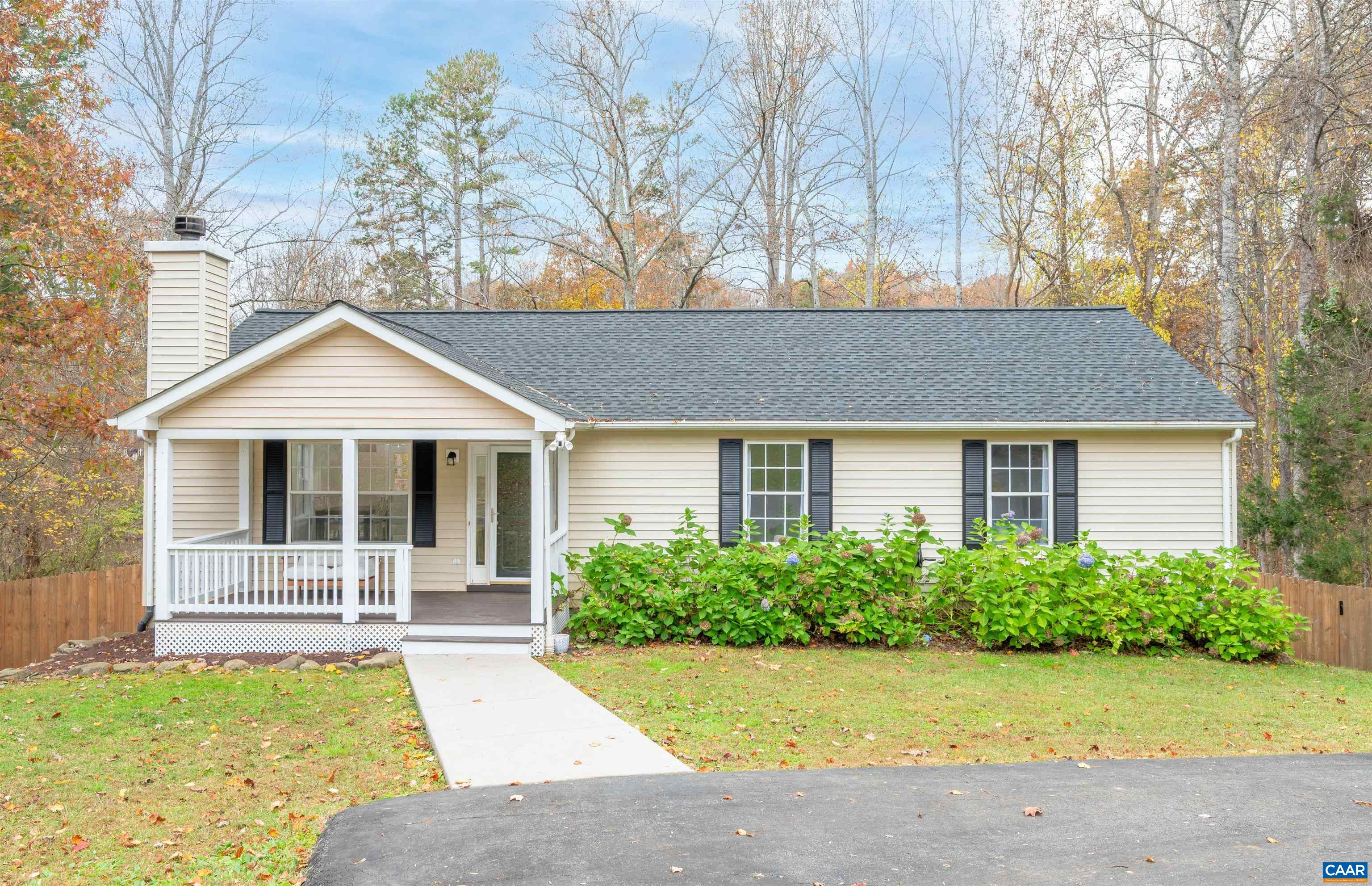 318 Larkspur Road Ruckersville, VA 22968 - Photo 1 of 42 a front view of a house with yard
