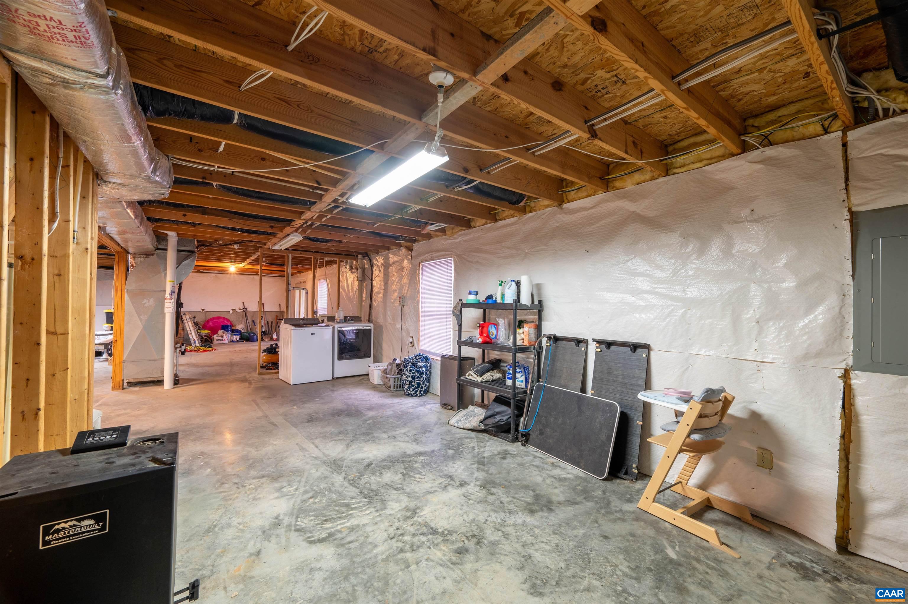 318 Larkspur Road Ruckersville, VA 22968 - Photo 31 of 42 a view of a room with gym equipment