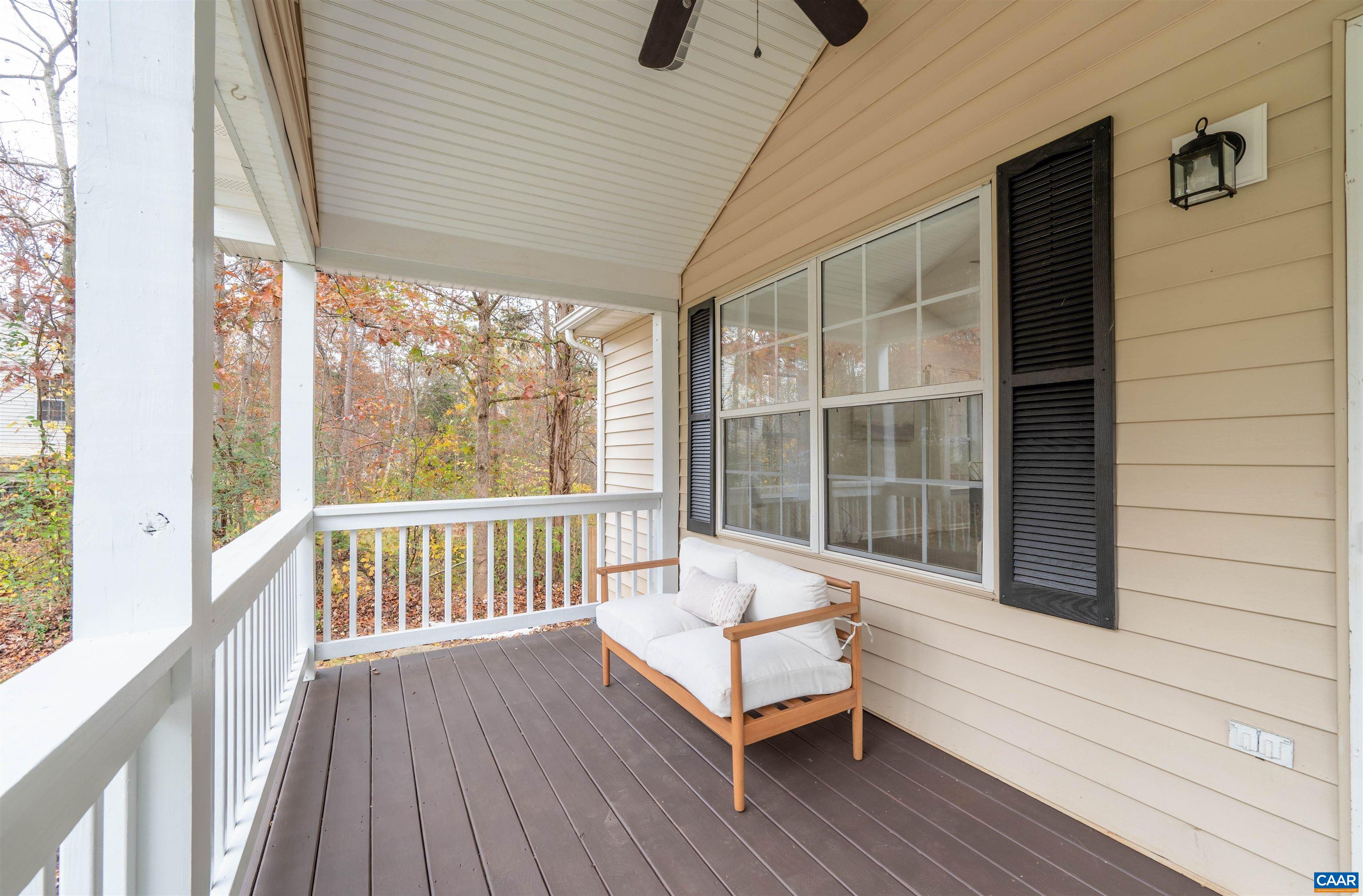 318 Larkspur Road Ruckersville, VA 22968 - Photo 7 of 42 a view of a two chairs in the balcony