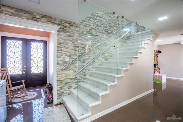 a view of entryway with wooden floor