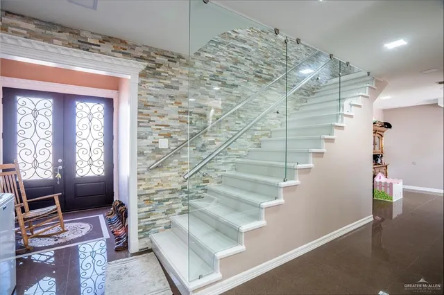 a view of entryway with wooden floor
