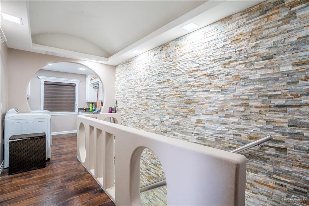 306 R Street Weslaco, TX 78596 - Photo 23 of 33 a view of balcony with wooden floor and fence