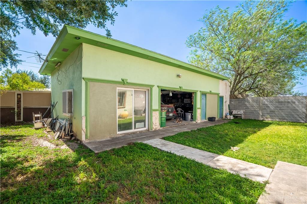306 R Street Weslaco, TX 78596 - Photo 26 of 33 a view of a house with backyard porch and sitting area