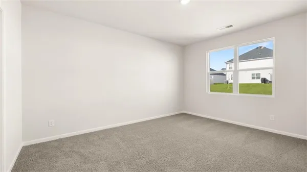 a view of an empty room with window