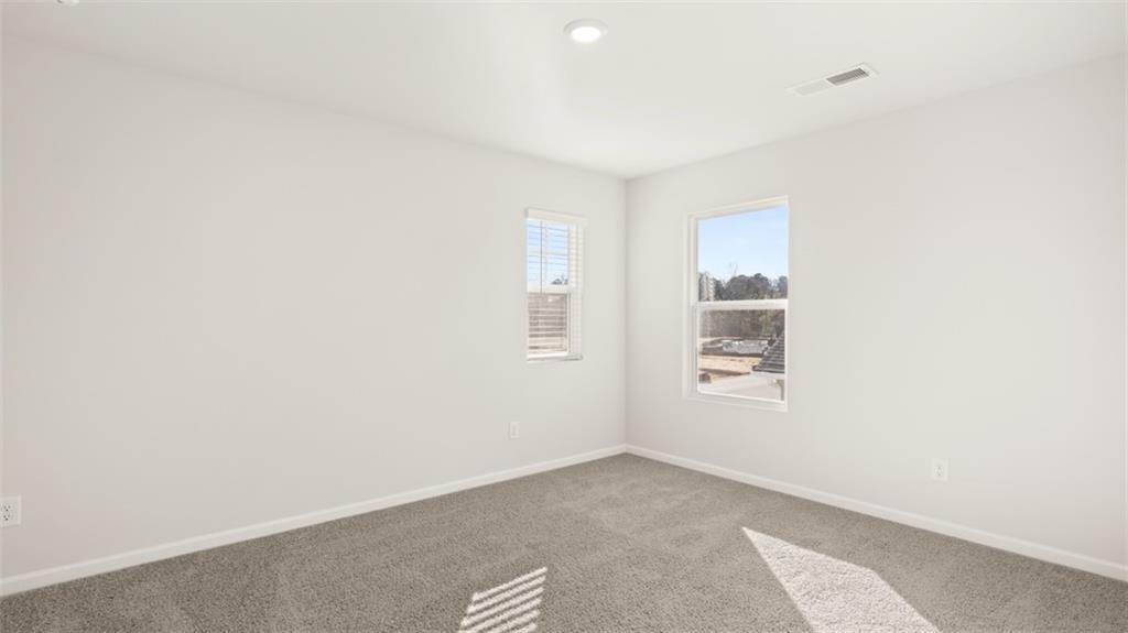 211 Cattle Drive Perry, GA 31069 - Photo 31 of 39 a view of a livingroom with an empty space and a window