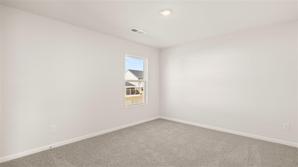 211 Cattle Drive Perry, GA 31069 - Photo 35 of 39 an empty room with a window