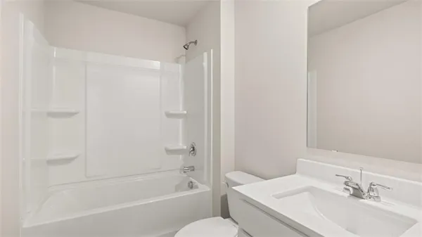 a bathroom with a sink toilet and bathtub