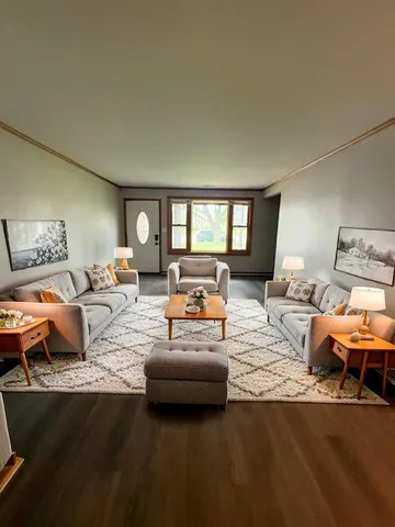 a bedroom with furniture and a couch