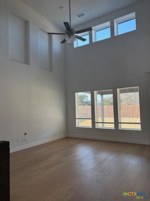 413 Blue Sage Lane Salado, TX 76571 - Photo 2 of 14 an empty room with a empty space and windows
